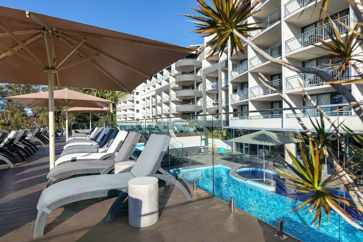 Pool and loungers in front of The Landmark Resort Nelson Bay